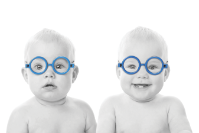 Twin Babies with blue glasses